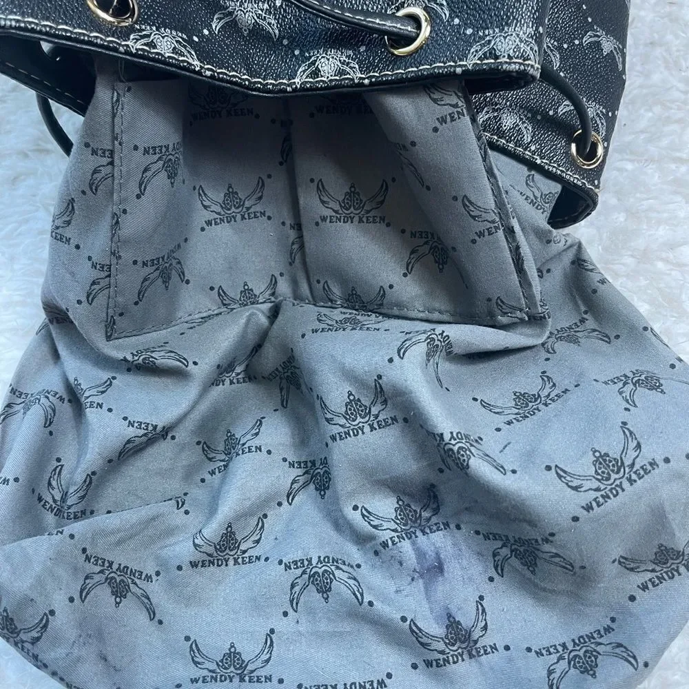 Wendy Keen Synthetic black and gray logo Backpack drawstring top closure.
